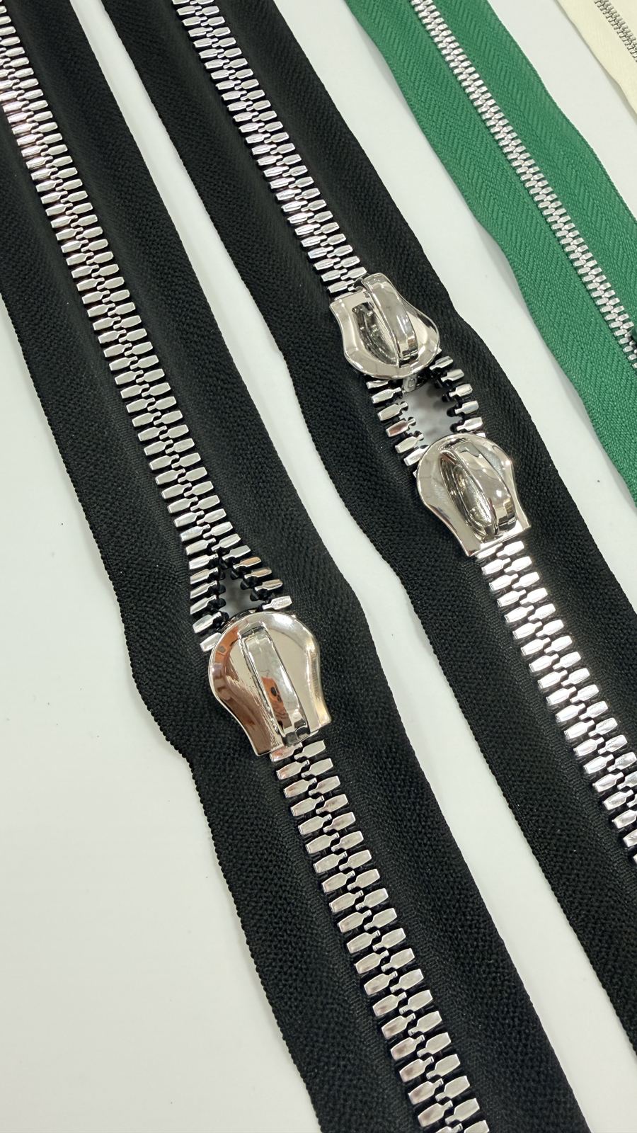 Reinforced resin zipper
